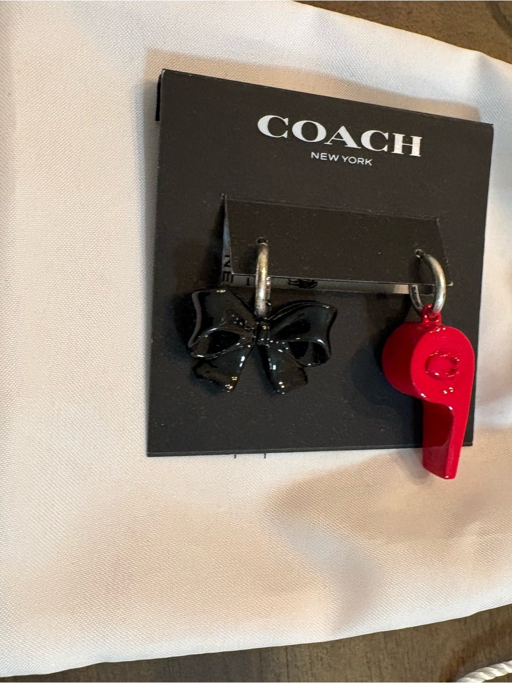 Coach Black Bow and Red Whistle Charm Earrings